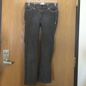 Worn womens grey jeans size 4/27.  A-25